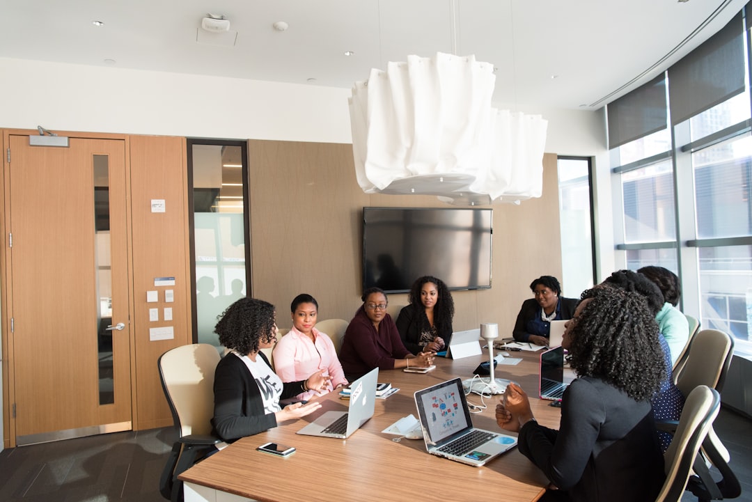 Professionals collaborating during a strategy meeting in a modern office